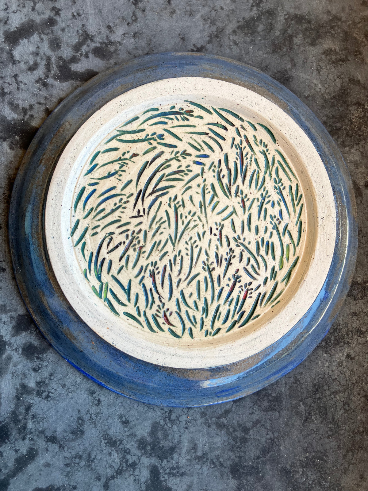 X-Small Plate with mountain bikers