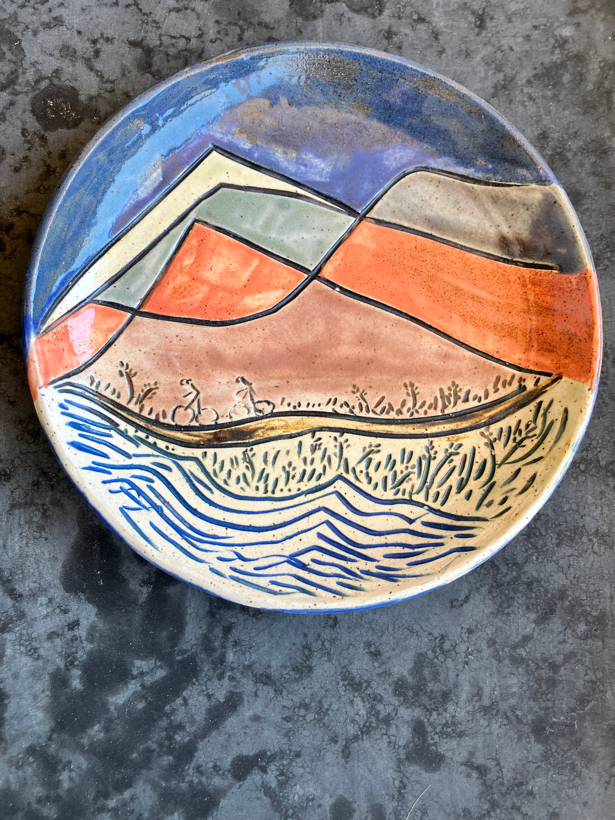X-Small Plate with mountain bikers